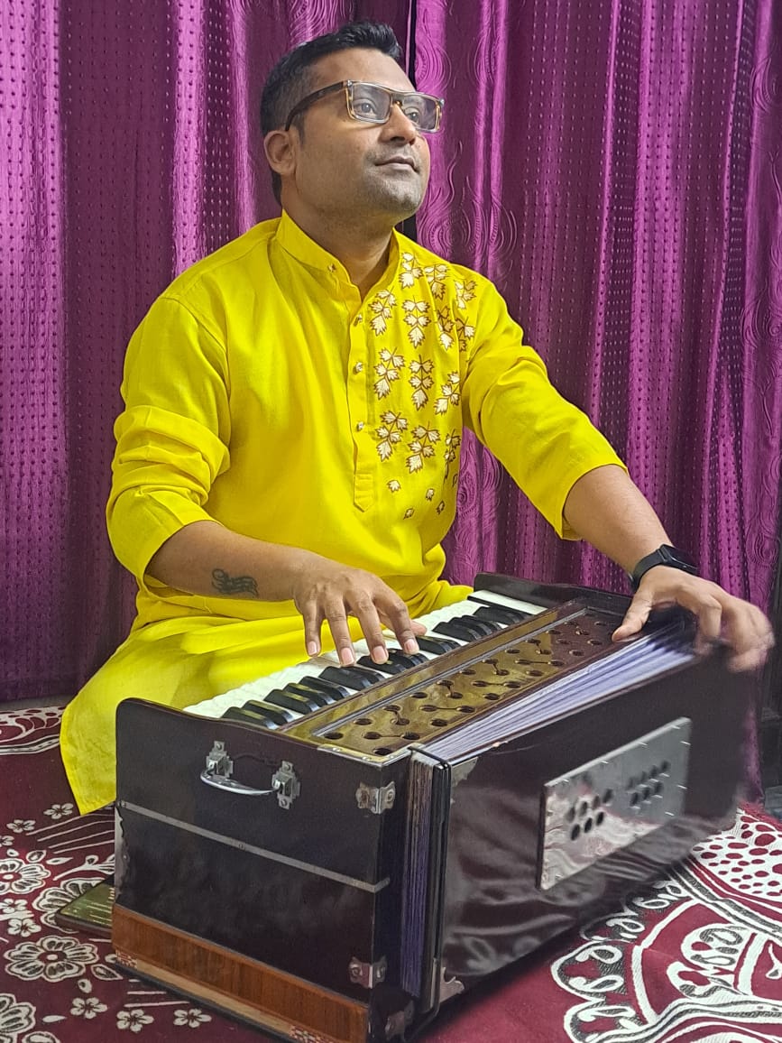 Vicky Ji with harmonium